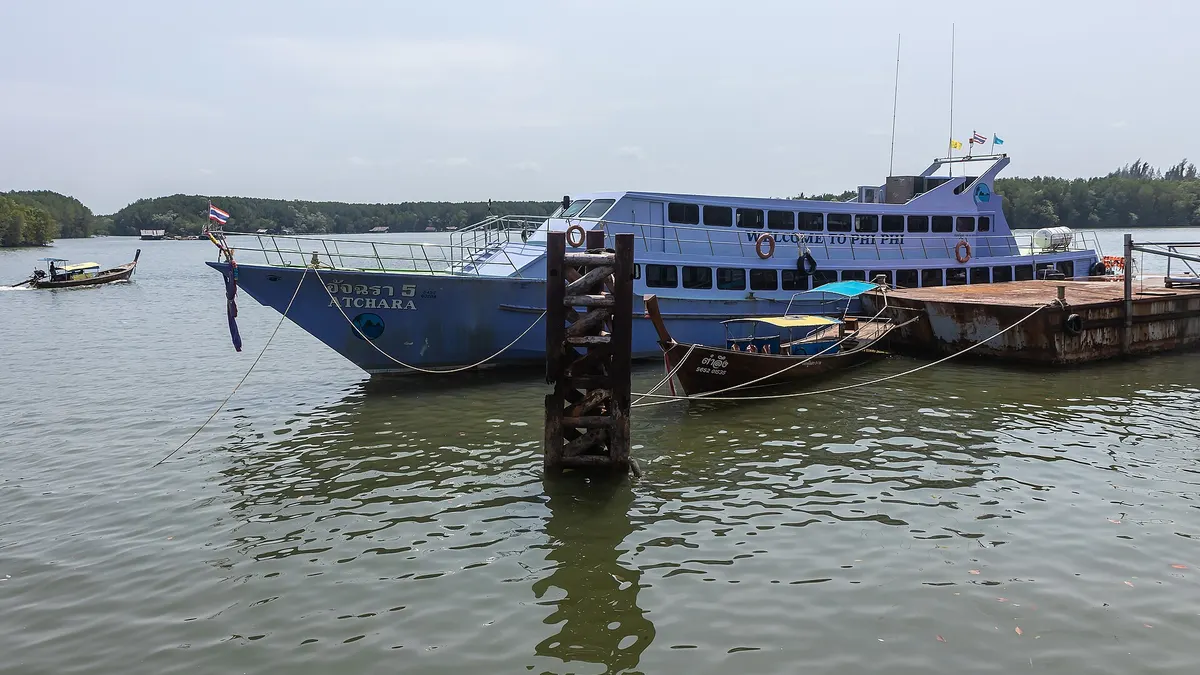 Passenger boat moored at the pier for Koh Lanta